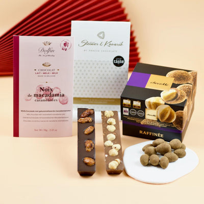 Nüsse in Schokolade-Set als Geschenkidee mit Abbildung Tafelschokolade, Riegeln und Mandeln